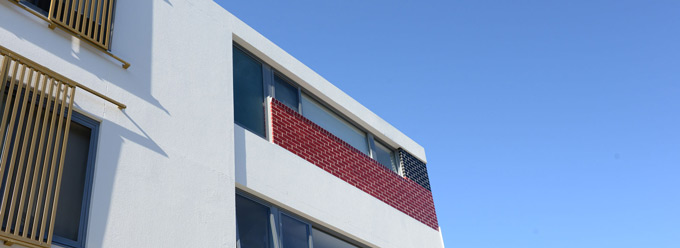 Strata building with blue sky