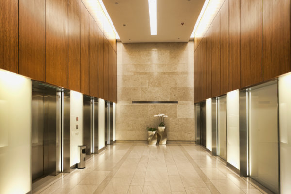 Modern lifts in airy lobby